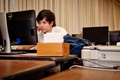 Student in front of a Dell computer