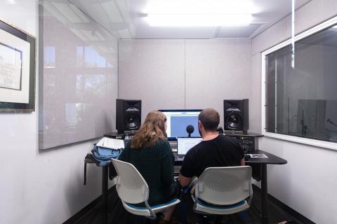 two people working on a project in the FAL recording studio