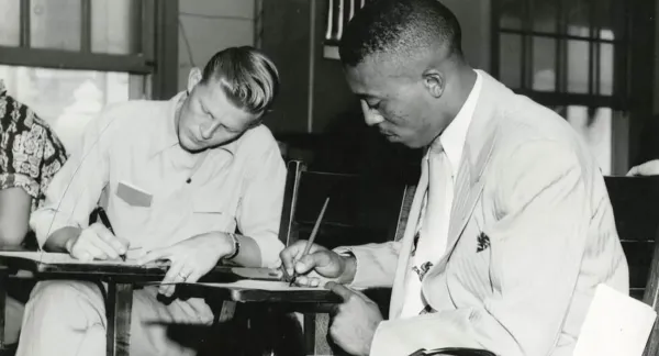 John S Chase seated at class as a student